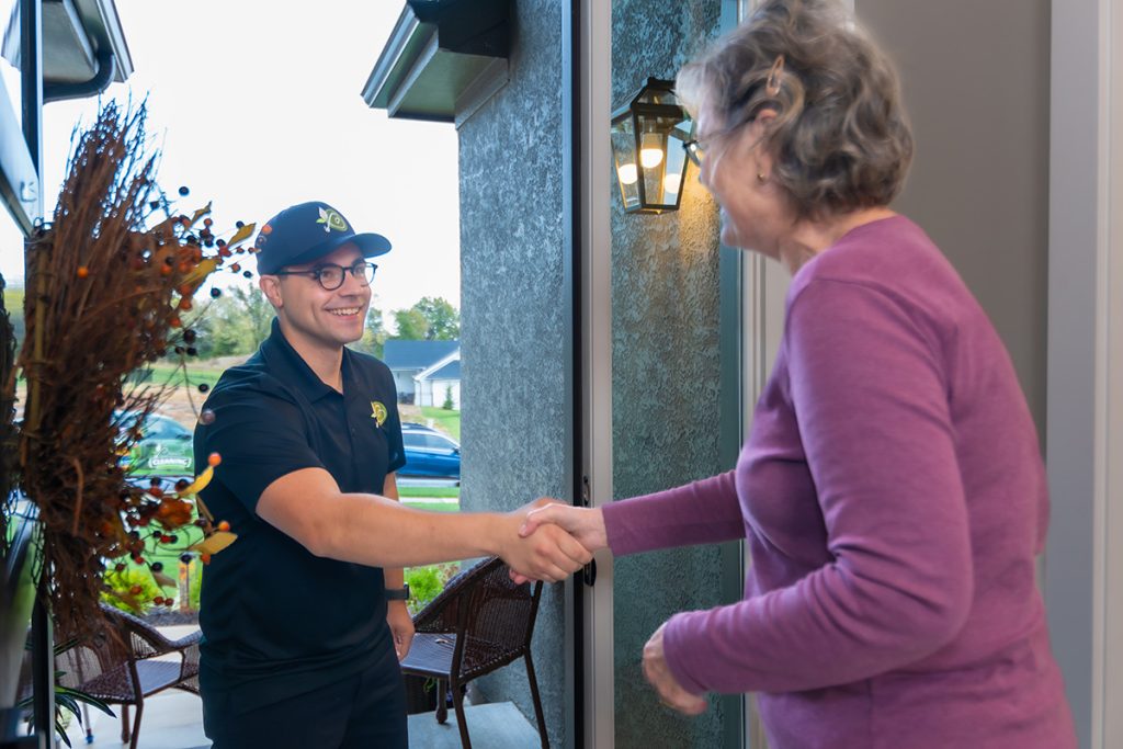 bianco-cleaning-services-our-promise-to-you-cleaner-greeting-customer-at-front-door